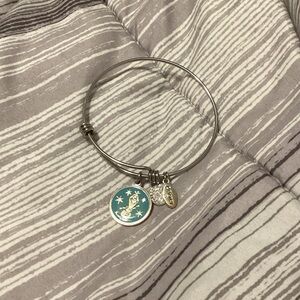 Chic Silver Bangle with Gold Charms